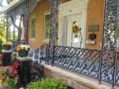 The Peoria Chapter coated the ironwork surrounding the front and back porches of the chapter headquarters.
