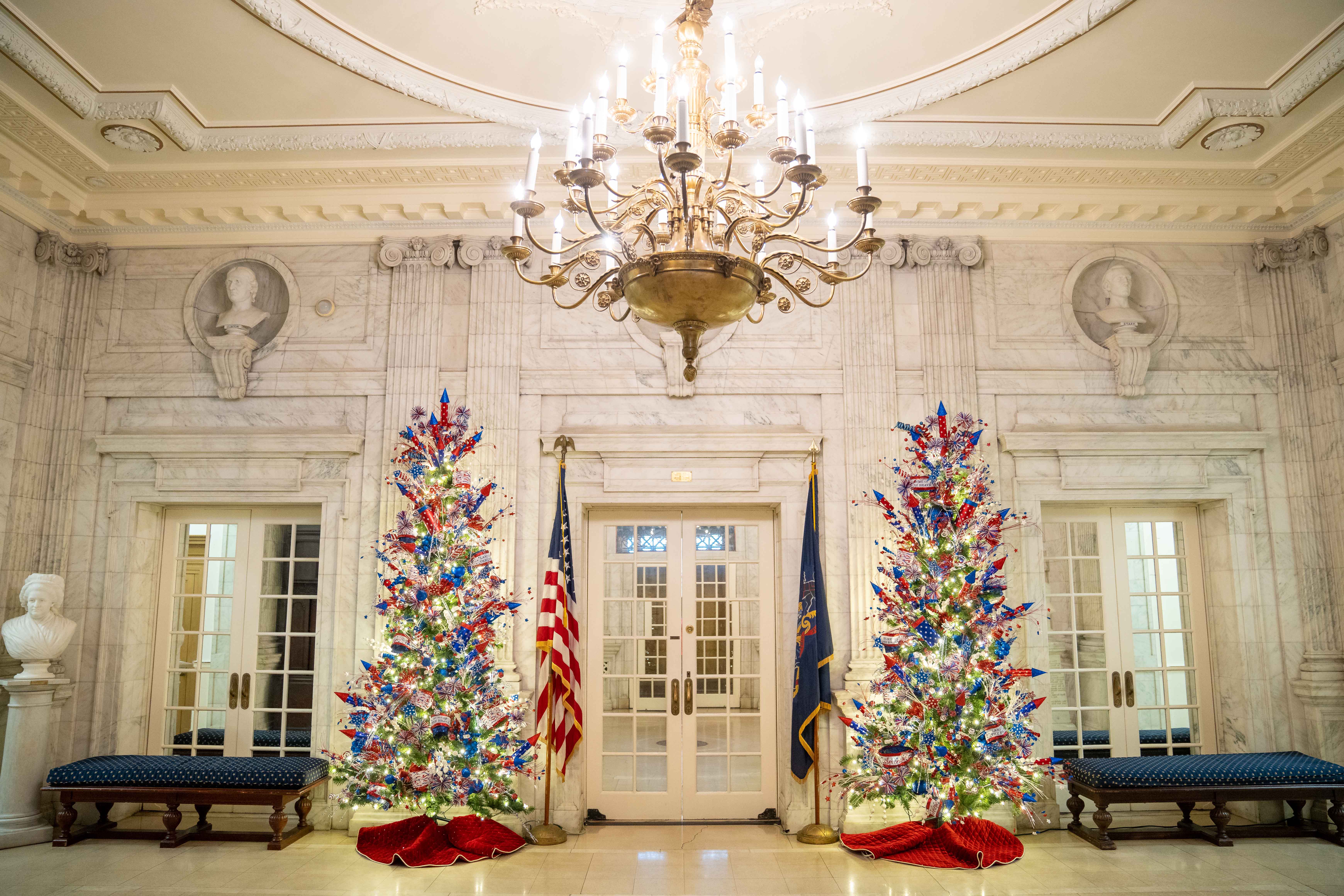 DAR entrance halls with two Christmas trees decked out in red, white, and blue