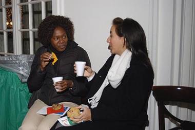 Guests enjoy hot cocoa and cookies at the DAR Open House.