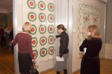 Open House guests view quilts in the DAR Museum’s permanent gallery.