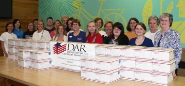  On this DAR Day of Services, Yates Mill Chapter in Cary, NC, worked with Military Missions in Action to pack care packages for active military stationed in Afghanistan.