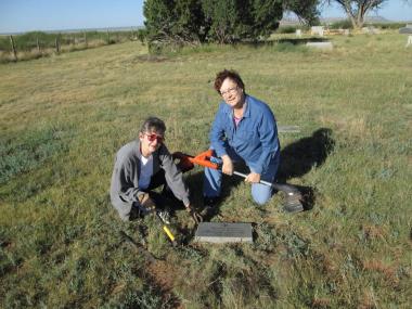 Tucumcari Chapter, Tucumcari, New Mexico members Gwen Gray and Wanda Evans at Quay Cemetery. Cleaned the weeds and grass around grave marker for Civil War Veteran, Abijah Keith. Other members worked at the Tucumcari Historical Museum cleaning out the Christmas shed.