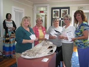 Grant Recipient, Education Category: Seminole County Historical Society Sanford, Fla. Members of sponsoring Sallie Harrison Chapter and museum personnel hold some of the 500 new labels purchased for the Museum of Seminole County History. The new labels contain information pertinent to each exhibit to enhance the educational experience of visitors.