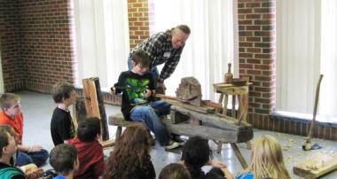 Terry Ratliff is a craftsman who was also part of the Visiting Artist Series. Mr. Ratliff makes chairs, tables, stools, benches and mantelpieces for a living. He showed students how to use a maul, a drawing horse, froe and adze to make ladder-back chairs.