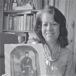 Lena Ferguson holding picture of Civil War ancestor John Curtis Gay casualty cold harbor 1864