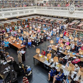 Members gathered in the library 