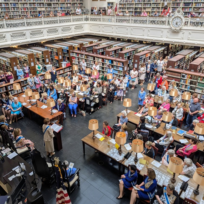 Members gathered in the library 