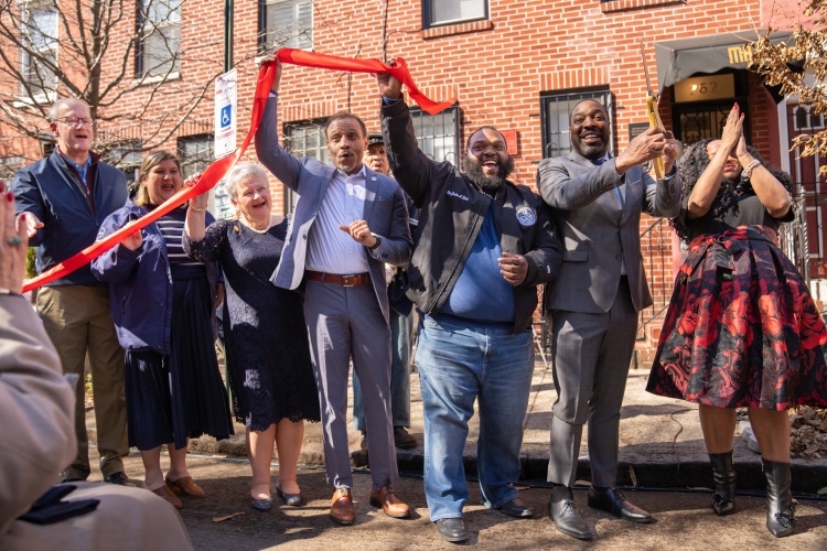 Dignitaries cheering after Marian Anderson Museum Ribbon Cutting 