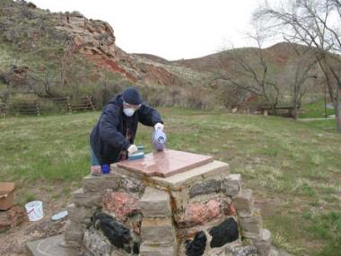 Wyoming's Big Horn Chapter conserved and re-dedicated a sandstone monument placed by a DAR chapter in the 1920s marking the site of an original bathhouse used by Shoshone Indian Chief Washakie.
