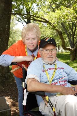 DAR Member, Barbara Peluso of the Ezra Parker Chapter in Royal Oak, Michigan, volunteers with an Honor Flight visit to Washington, DC. In this photo she is pictured with her WWII veteran who she assisted during the trip. Many DAR members are passionate about helping our veterans visit their monument in Washington, DC and many like Barbara have become active volunteers with their local Honor Flights.