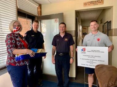 The Louis Joliet Chapter  dropped off goodies at both police and fire stations, and placed yard signs at each location.