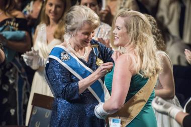 Paula Eichenbrenner is pinned by DAR President General after being named the DAR Outstanding Junior Member of the year.