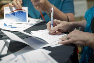 DAR members sign cards thanking military families through the Blue Star Families Operation Appreciation program.