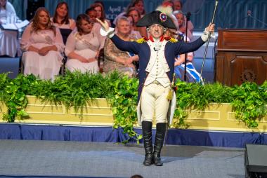 A man dressed as the Marquis de La Fayette gives a performance.