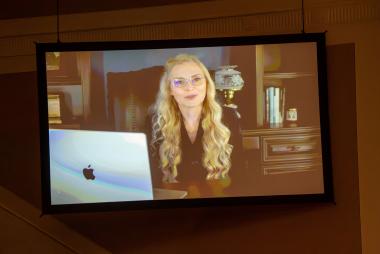 CeCe Moore gives greetings over video.