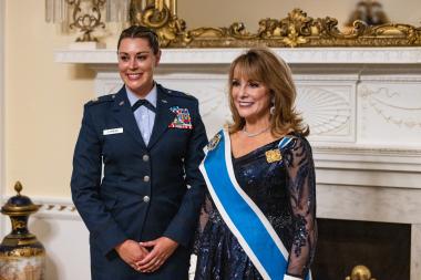 President General posing for picture with award winner 