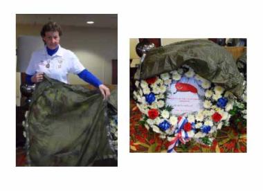 Karen Jordan Sinkovitz, a member of the Catherine Schuyler Chapter of New York, volunteered to make wreath covers for the wreaths laid on Veteran's Day at specific Airborne memorial markers at Arlington National Cemetery and major war memorials in Washington, DC, after observing that the previous year's covers were in disrepair. A retired Army Airborne Sergeant sent her an old green parachute, with the directions to make squares of cloth measuring 32". The final product was a set of thirteen covers with adj
