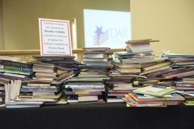 During Service to America Night, DAR members donated more than 600 children’s books to be donated to “Books 4 Kids,” a pediatric literacy program for military families at Walter Reed Medical Center. http://www.oakleafdc.org/benevolence/books4kids 