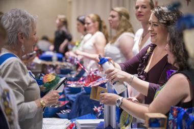 Attendees enjoyed shopping and visiting with each other at Celebrate America Night.