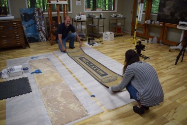 A few of the pieces of the state name murals that needed extra attention or extensive repairs were taken off-site to the conservator’s studio to be worked on in a more stable environment. 