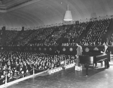 Following the historic Lincoln Memorial concert, Marian Anderson did perform at Constitution Hall on numerous occasions. She is pictured here on January 7, 1943 singing on the stage of Constitution Hall during a benefit concert for war relief. For more information on other times Marian Anderson performed in Constitution Hall, visit: www.dar.org/mariananderson/CHperformances 