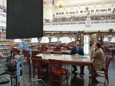 During a break Bill Paxton and the genealogist are able to chat about what he has discovered thus far. The beautiful DAR Library serves as their backdrop.