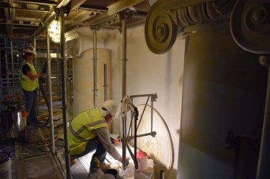 The paint all around the columns and medallions were stripped and underwent some plaster repair and repainting. 