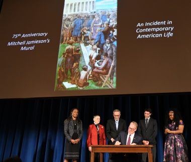 U.S. Secretary of the Interior signing a proclamation naming the Marian Anderson mural as the first element within the new African American Civil Rights Network Act, a program intended to preserve and protect the memory of the civil rights movement. Ceremony at the Department of the Interior, February 1, 2018.