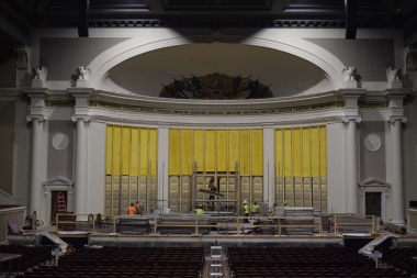 The yellow and egg carton looking material along the wall of the stage is special acoustic treatment to help enhance the sounds in Constitution Hall during shows.