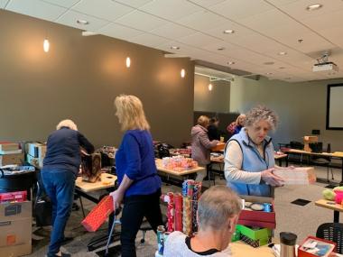 DAR members pack and wrap care packages. 