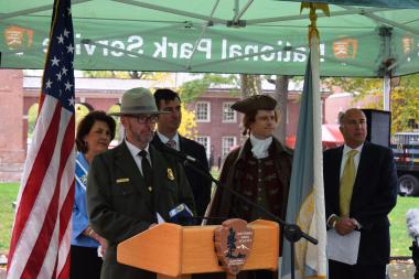 Acting Superintendent of Independence National Historical Park Patrick Suddath welcomed those to the tree planting ceremony, thanking DAR for the gift and joked that the rainy weather of the day would be perfect for the newly planted trees.