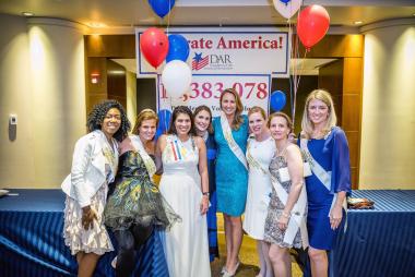 DAR members gather for a fun evening of socializing and learning at Celebrate America Night. Members had a lot to celebrate that night -- 14,383,078 hours of volunteer service.
