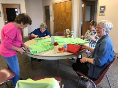 The Ann Rogers Clark Chapter made lap blankets for local veterans in assisted living homes & women veterans