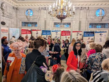 Women in foyer with museum exhibit