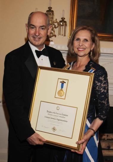 The DAR honored the USO with the President General's Medallion in celebration of their 75th anniversary. USO President and CEO Dr. J.D. Crouch accepted the award on behalf of all those who have supported the efforts of the USO over the past 75 years.