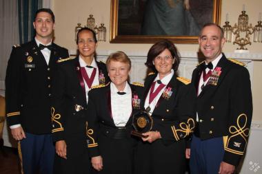 Nurses from the Army Nurse Corps gather to celebrate COL Anna Corulli on being awarded the DAR's Dr. Anita Newcomb McGee Award.