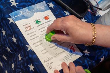 Woman stamping a card