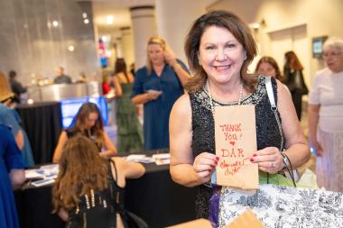 Member participates in care package project