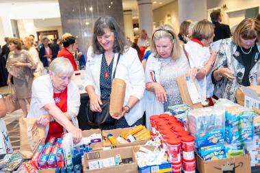 Woman fill care packages