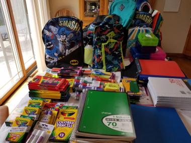 The Mary Warrell Knight Chapter collected 20 backpacks and school supplies and supported a teacher with supplies and a gift card.