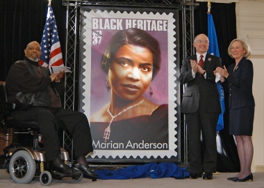 January 27, 2005 – James DePreist, John Nolan and Presley Wagoner admire the new Marian Anderson Stamp, the 28th in the U.S. Postal Service's Black Heritage series.