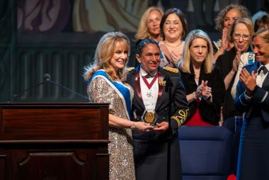 United States Army Nurse Corps Colonel accepts award from President General of the United States