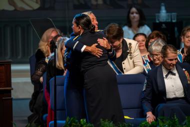 United States Army Nurse Corps Colonel hugs a veteran