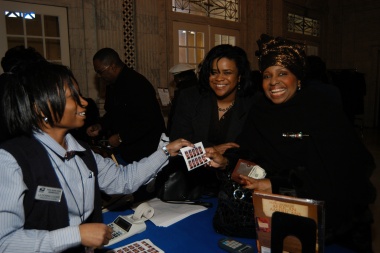 January 27, 2005 – U.S. Postal Service staff selling ceremony collectibles and first day of issue cancellations to philatelists in the Pennsylvania Foyer of DAR Headquarters.