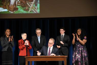 Secretary Ryan Zinke signing a proclamation naming the mural as the first element within the new African American Civil Rights Network Act, a program intended to preserve and protect the memory of the civil rights movement