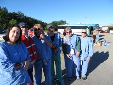 Some members of the Job Winslow Chapter in Traverse City, MI participated in the Traverse City Fire Station Drill. Six gals showed up one early one chilly summer morning in order to be moulaged (to be made to appear with mock injuries). They were definitely great actors as they showed their skills all the while serving as victims during the drill. All went well as they learned about the medical and emergency functions of their city.