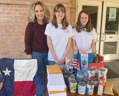 The Alexander Love Chapter collected goods for their local food pantry.