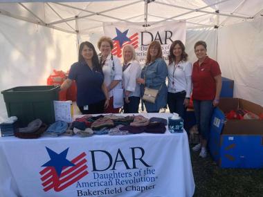 The Bakersfield Chapter served their Veterans at the annual Kern County Veterans Stand Down. They distributed blankets, hats and hygiene kits to Veterans who are unstably housed.