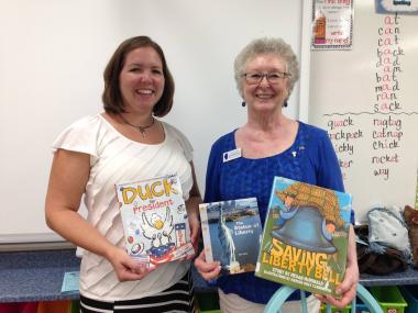 The Fox River Valley Chapter, IL was invited to participate in their local elementary school's reading night by reading books aloud to the group