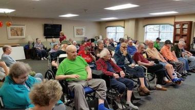 Fort Augusta Chapter, PA volunteered at their local assisted living facility by presenting pillows to veteran residents and thanked them for their service